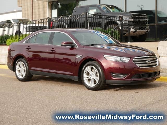 Used 2018 Ford Taurus SEL with VIN 1FAHP2E87JG134561 for sale in Roseville, Minnesota