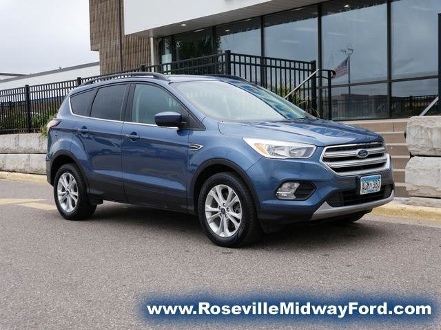 Used 2018 Ford Escape SE with VIN 1FMCU9GD4JUC08273 for sale in Roseville, Minnesota