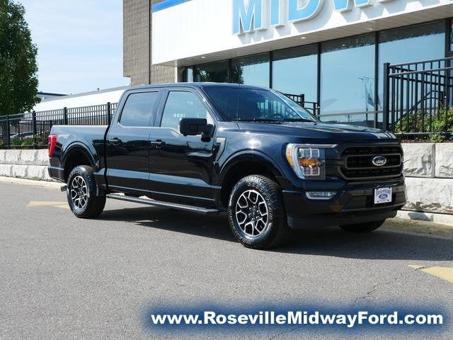 Used 2021 Ford F-150 XLT with VIN 1FTEW1EP0MFC60949 for sale in Roseville, Minnesota